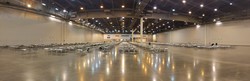 NRG Stadium set up with fresh cots and ready to receive new arrivals.